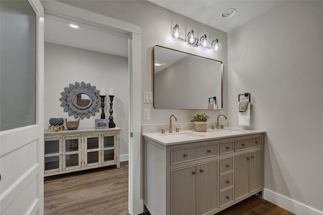 902 W Mill St, New Braunfels, TX 78130 - bathroom with vanity and hardwood / wood-style floors