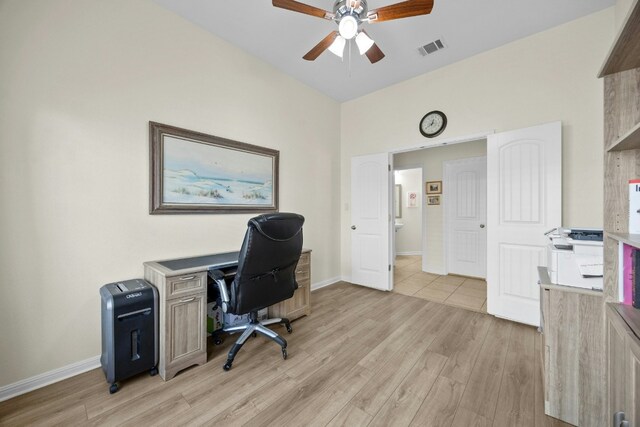 1017 Matheson Dr, Leander, TX 78641 - home office with ceiling fan, light wood-style flooring, and baseboards