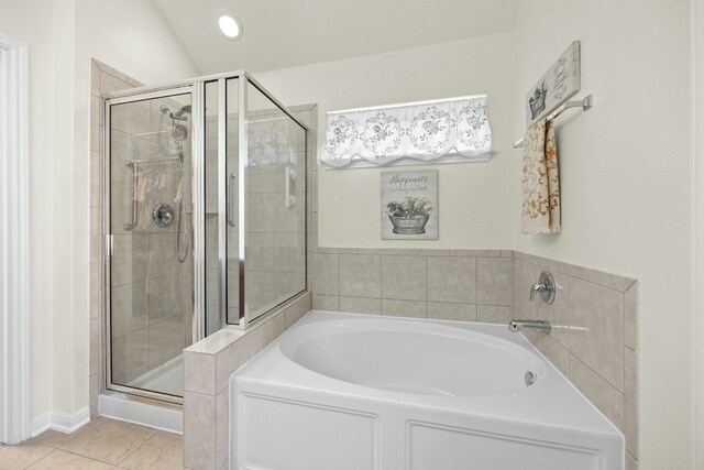 1017 Matheson Dr, Leander, TX 78641 - bathroom featuring a bath, a shower stall, tile patterned flooring, and recessed lighting