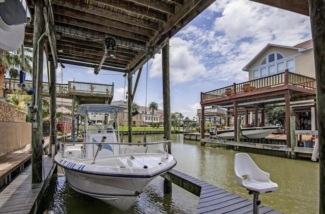 dock area featuring a water view