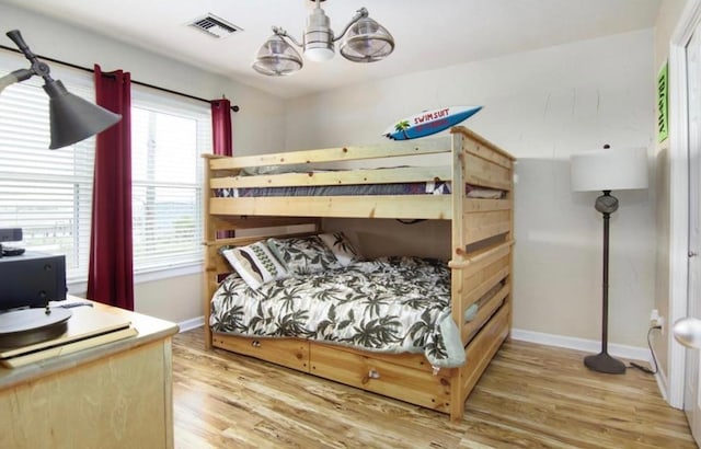 bedroom featuring hardwood / wood-style flooring