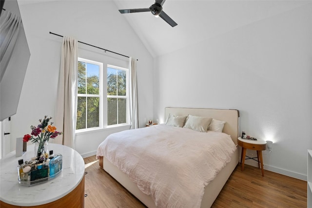 3809 Valley View Rd Unit 19, Austin, TX 78704 - bedroom with wood finished floors, baseboards, high vaulted ceiling, and a ceiling fan