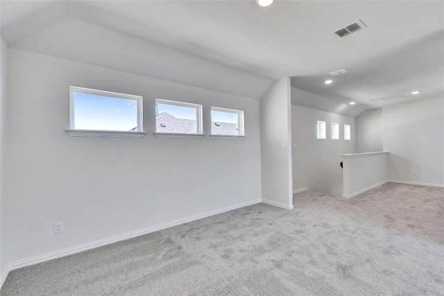 interior space featuring recessed lighting, carpet floors, visible vents, and baseboards