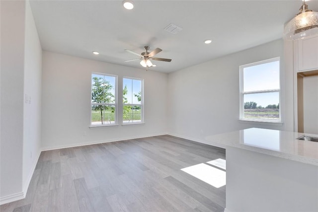 530 Ansley Ct, Taylor, TX 76574 - empty room featuring a ceiling fan, light wood finished floors, and recessed lighting
