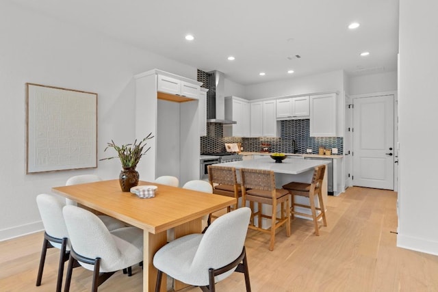 2707 Dulce Ln Unit 7, Austin, TX 78704 - dining space featuring light wood-style floors and recessed lighting