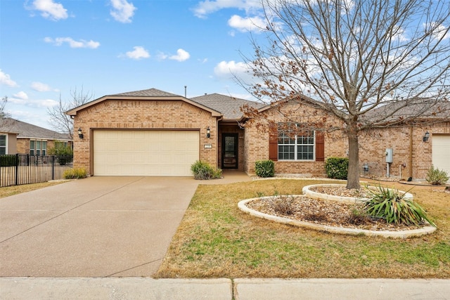 ranch-style house featuring a garage and a front yard