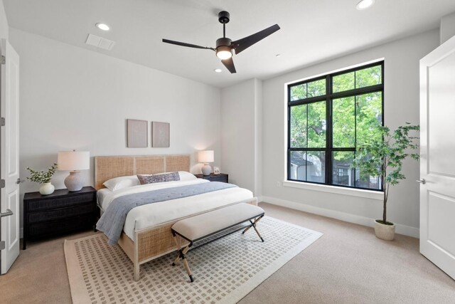 2707 Dulce Ln Unit 12, Austin, TX 78704 - bedroom featuring light colored carpet, recessed lighting, baseboards, and ceiling fan