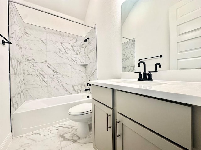 full bathroom featuring vanity, toilet, and tiled shower / bath