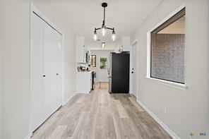 hall featuring light hardwood / wood-style floors