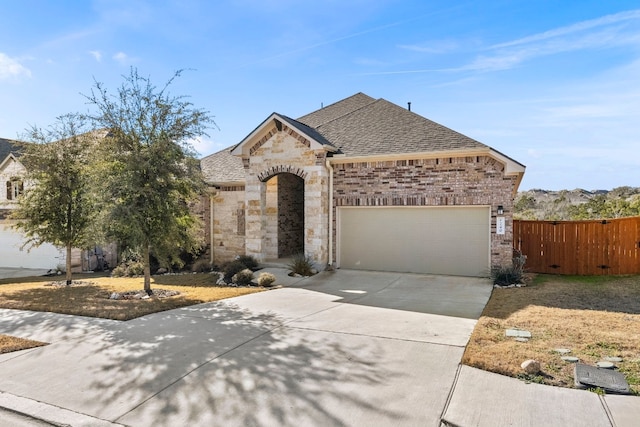 view of front of property featuring a garage