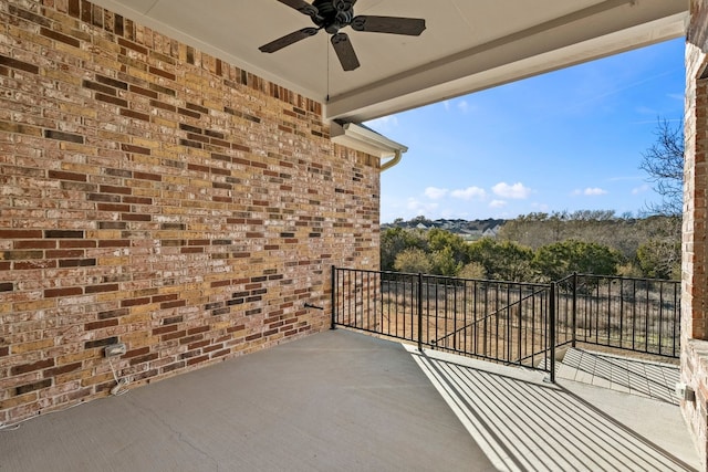 balcony featuring ceiling fan