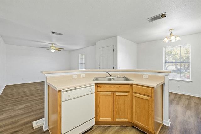 kitchen with ceiling fan with notable chandelier, white dishwasher, sink, and hardwood / wood-style floors