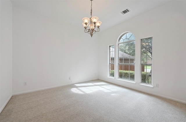 10104 Hibiscus Cv, Austin, TX 78739 - spare room featuring a chandelier, plenty of natural light, carpet floors, and baseboards