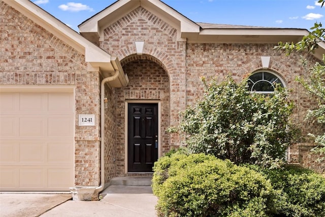 property entrance featuring a garage