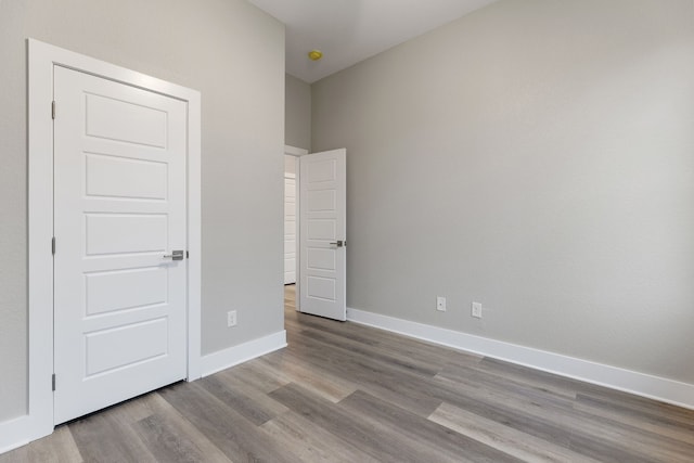 unfurnished bedroom with light hardwood / wood-style floors