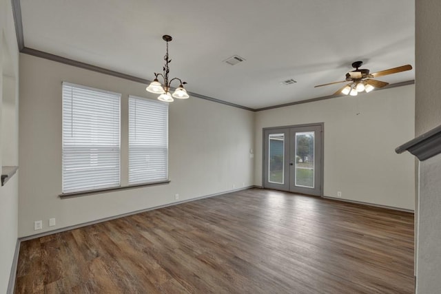 unfurnished living room with french doors, ornamental molding, dark hardwood / wood-style flooring, and ceiling fan with notable chandelier