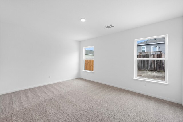 view of carpeted spare room