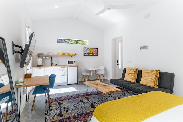 11233/4 Gunter St Unit 2, Austin, TX 78702 - living room with visible vents, a ceiling fan, bar area, beamed ceiling, and high vaulted ceiling