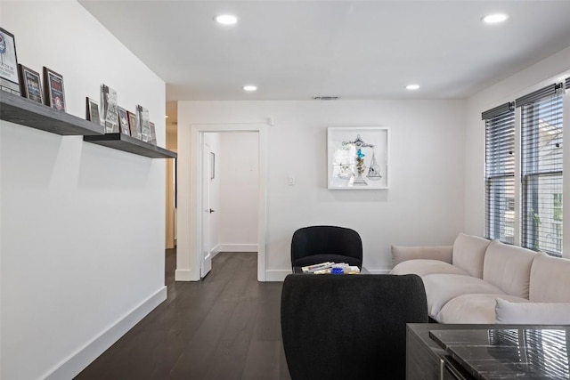 living room with dark wood-type flooring