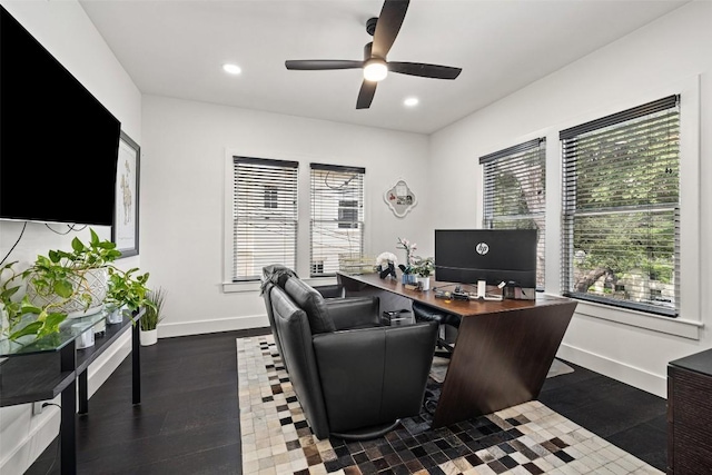 office featuring ceiling fan and dark hardwood / wood-style flooring