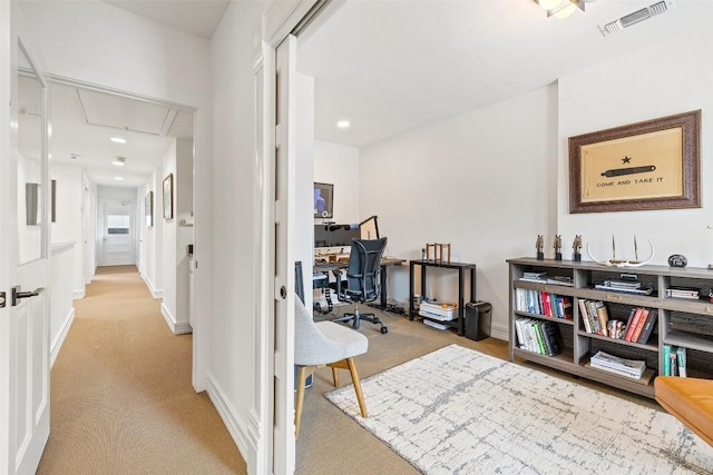 hallway with light carpet