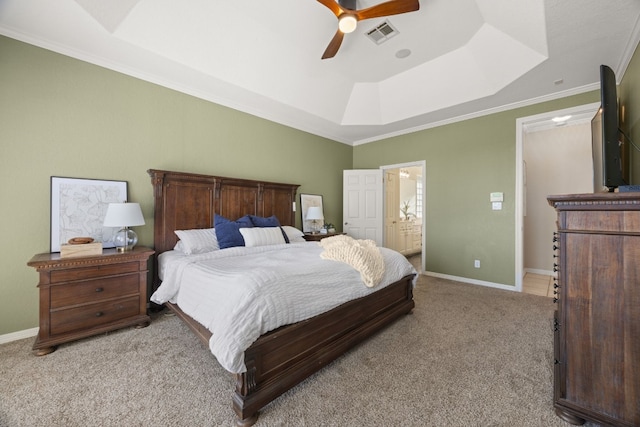 1207 Hyacinth Dr, Temple, TX 76502 - bedroom with light carpet, a tray ceiling, ensuite bath, ornamental molding, and ceiling fan