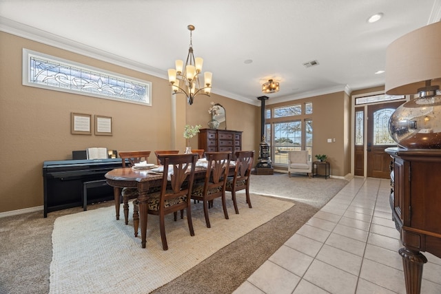 1207 Hyacinth Dr, Temple, TX 76502 - dining room with light colored carpet, a chandelier, ornamental molding, and light tile patterned flooring