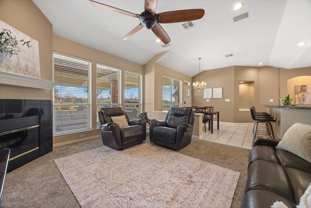 1207 Hyacinth Dr, Temple, TX 76502 - tiled living area with carpet flooring, a chandelier, ceiling fan, recessed lighting, and vaulted ceiling
