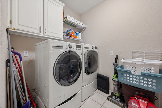 1207 Hyacinth Dr, Temple, TX 76502 - laundry room with separate washer and dryer, light tile patterned flooring, and cabinet space