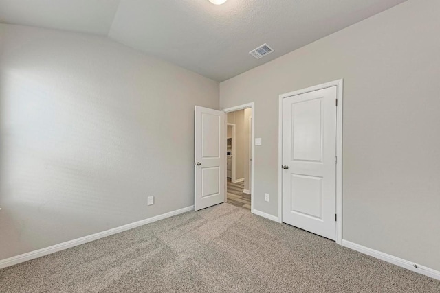 unfurnished bedroom featuring carpet flooring