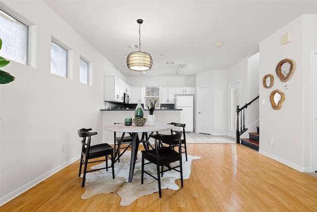 dining area featuring light hardwood / wood-style floors