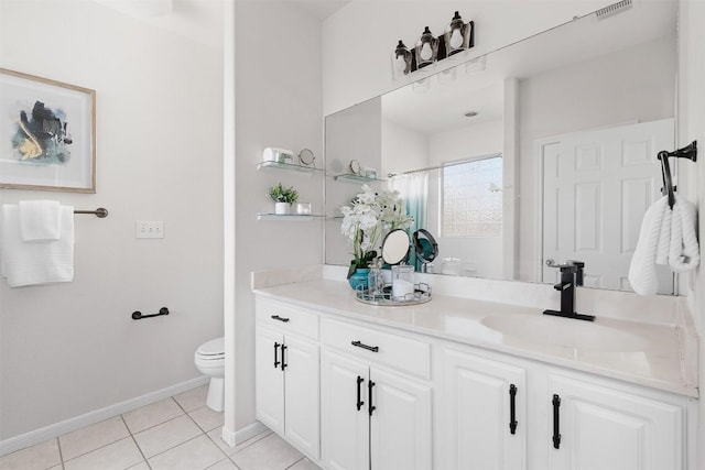 bathroom with vanity, a shower with shower curtain, tile patterned floors, and toilet