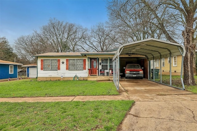 view of front of house with a carport, covered porch, and a front lawn