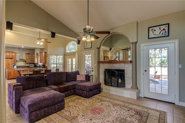 465 Hannah Dr, Dripping Springs, TX 78620 - living room with ceiling fan, a fireplace, high vaulted ceiling, and light tile patterned floors