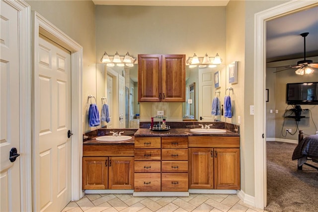 465 Hannah Dr, Dripping Springs, TX 78620 - full bath with double vanity and a ceiling fan