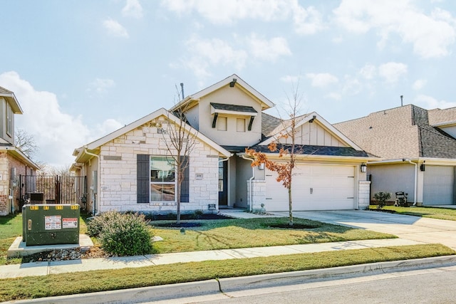 view of front of home featuring a garage and a front yard