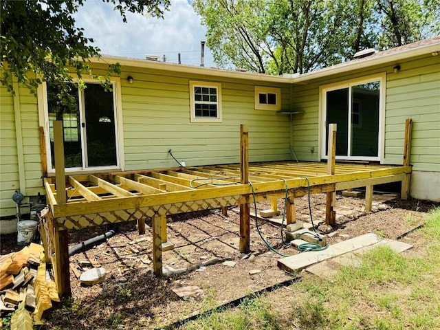 1406 Webberville Rd, Austin, TX 78721 - rear view of property with a wooden deck