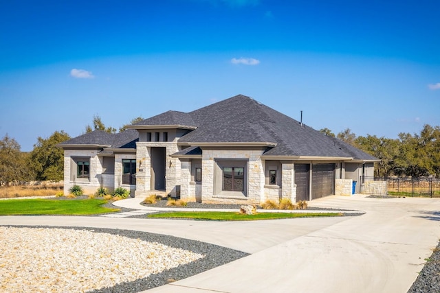 prairie-style house featuring a garage