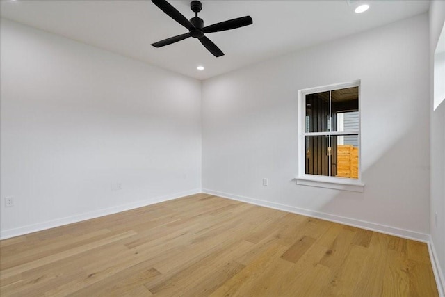 empty room featuring light hardwood / wood-style floors and ceiling fan