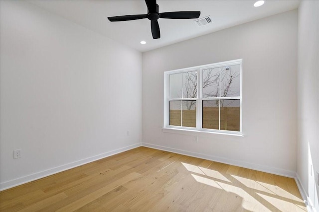 unfurnished room featuring ceiling fan and light hardwood / wood-style flooring