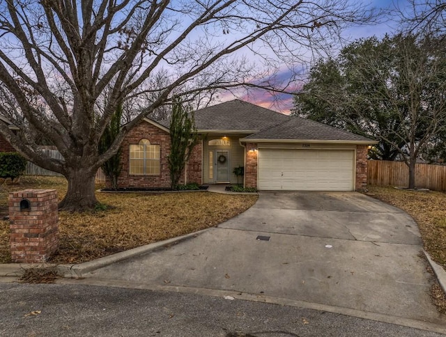 ranch-style house with a garage