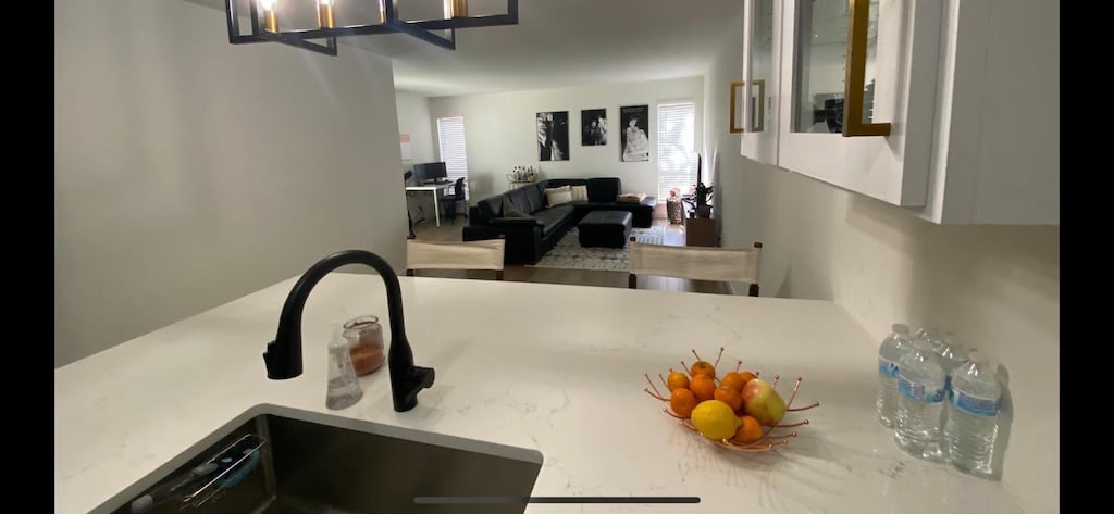 interior space with an inviting chandelier and sink