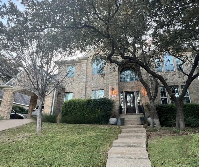 view of front of home with a front yard