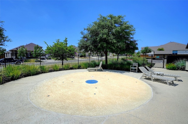 view of community with a patio