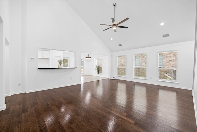 unfurnished living room featuring wood-type flooring, high vaulted ceiling, and ceiling fan