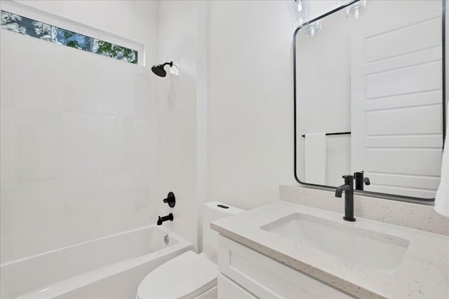 full bathroom with toilet, vanity, and bathtub / shower combination