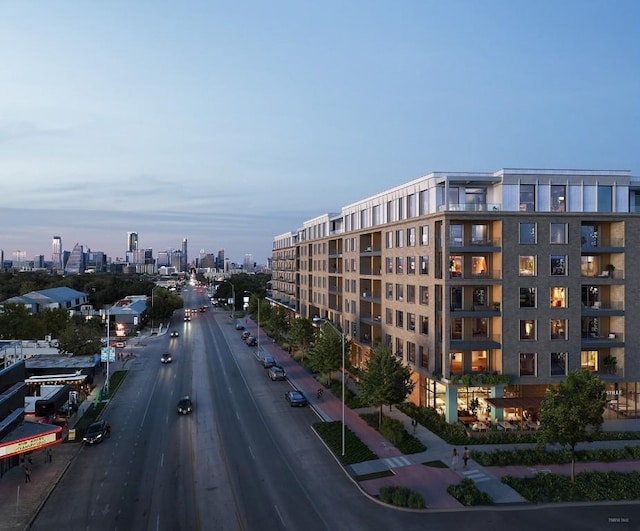 view of outdoor building at dusk