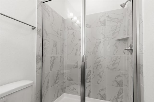168 Bosque Dr, San Marcos, TX 78666 - bathroom featuring toilet and a stall shower