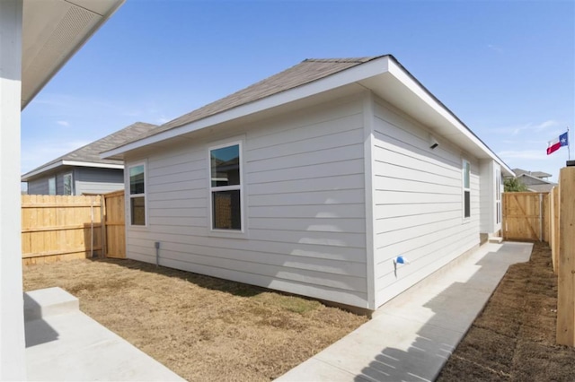 168 Bosque Dr, San Marcos, TX 78666 - view of property exterior featuring a fenced backyard