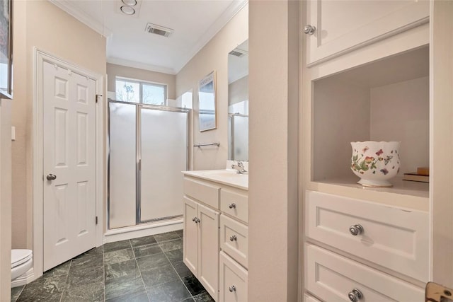 bathroom with toilet, crown molding, a shower with shower door, and vanity